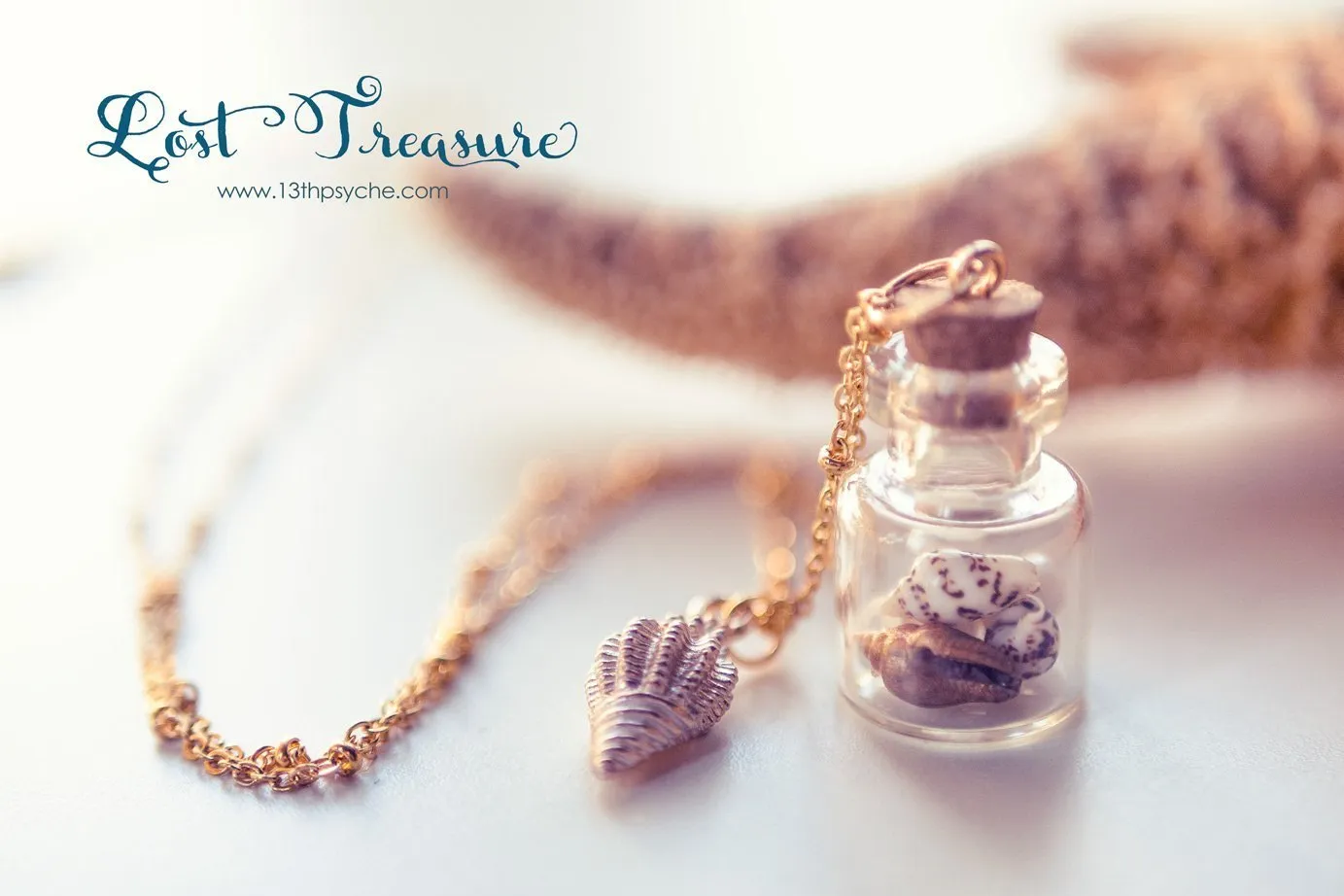 Gold shell bottle pendant necklace