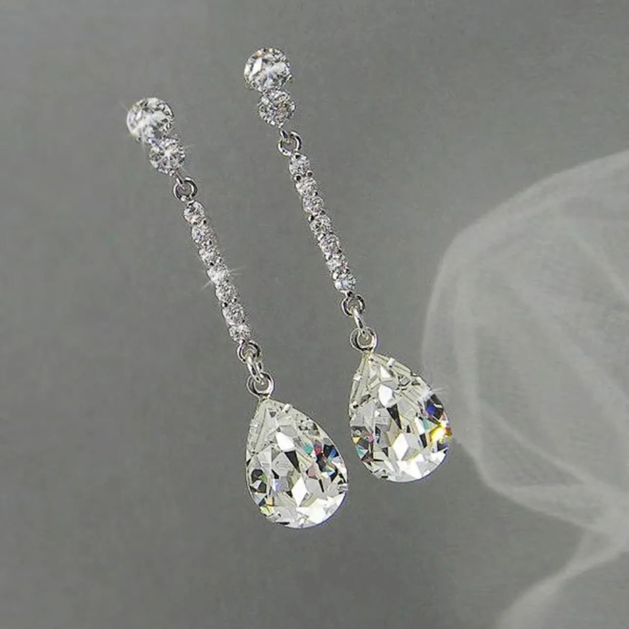 Luxury Long Silver Dangle Drop Earrings with Pear Cubic Zircon Main Stone.