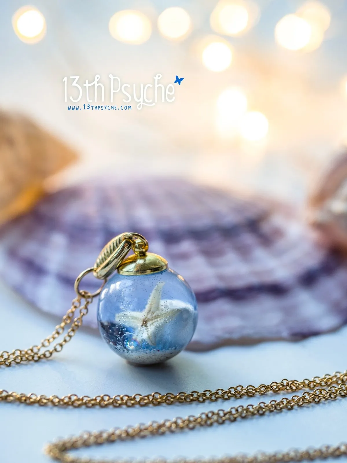 Ocean inspired Starfish and shells resin ball necklace