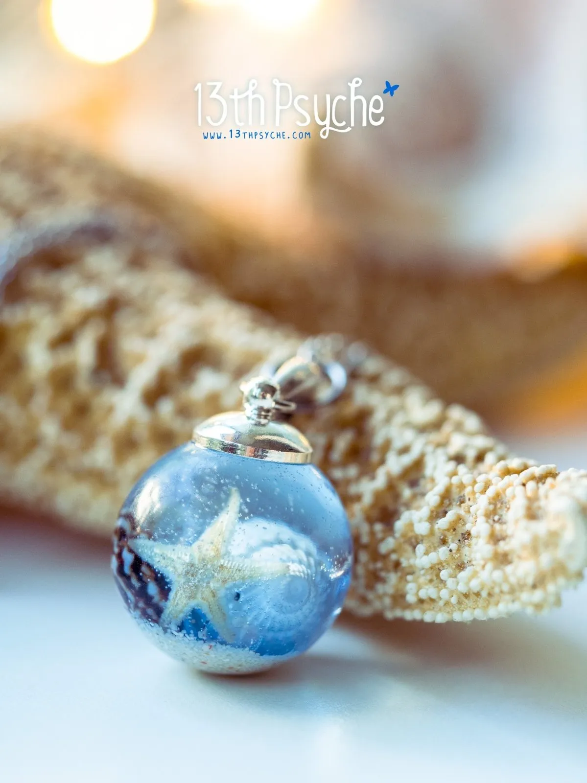 Ocean inspired Starfish and shells resin ball necklace