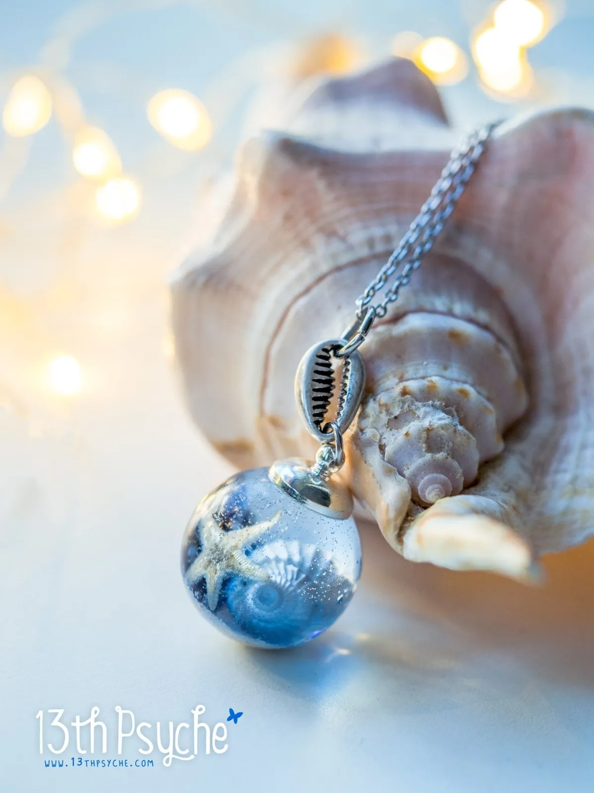 Ocean inspired Starfish and shells resin ball necklace